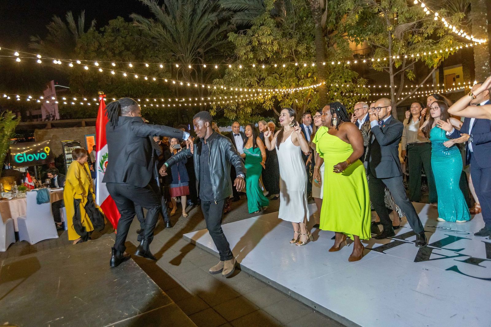 The dance floor under string lights